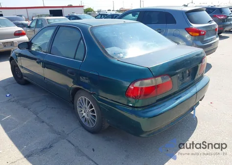 1999 Honda Civic Lx z USA, uszkodzony, nr VIN 2HGEJ6574XH504778